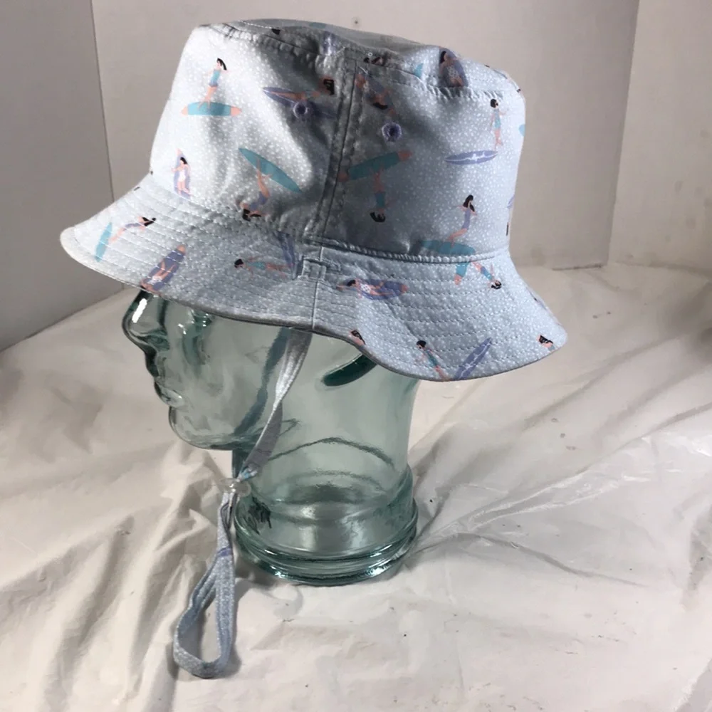 Mollymook Girls Reversible Light Blue With Surfer Girls Print A Sun Bucket Hat
